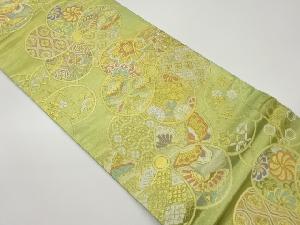 捻梅に古典柄模様織出し袋帯